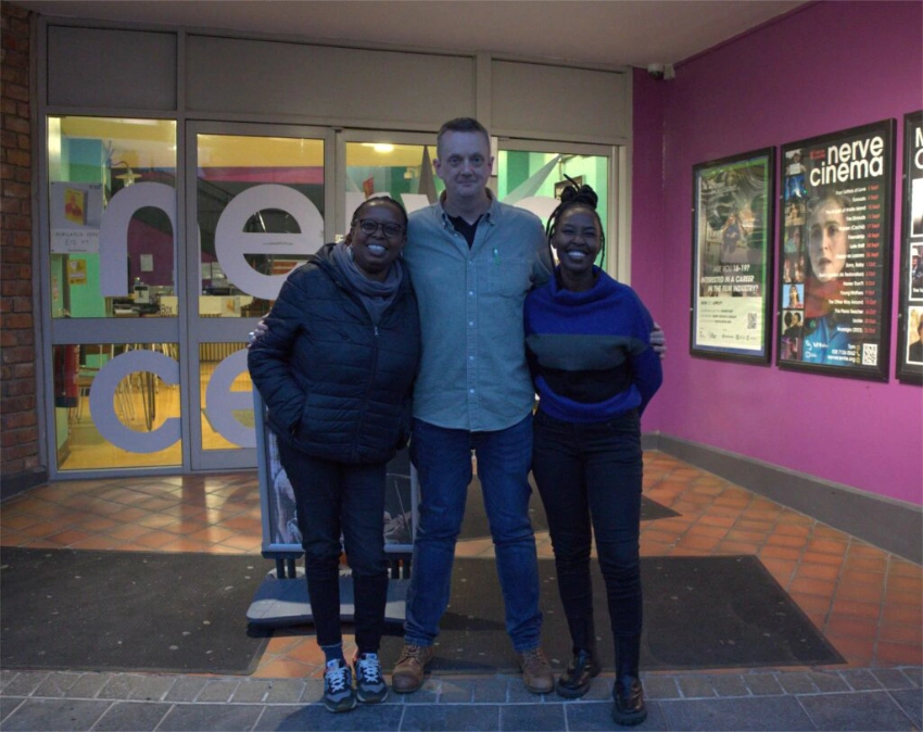 Conor Sharkey of the North West Migrants Forum with Fibby Kioria and Wanjeri Gakuru.
