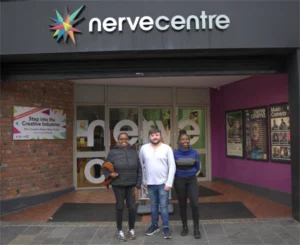 Conor Sharkey of the North West Migrants Forum with Fibby Kioria and Wanjeri Gakuru.