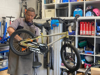 Mogahid showing no sign of 'tyre-ing' as he works on a bike