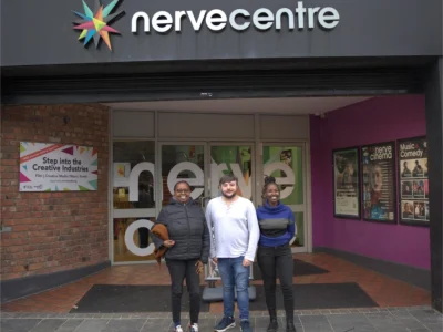 Conor Sharkey of the North West Migrants Forum with Fibby Kioria and Wanjeri Gakuru.